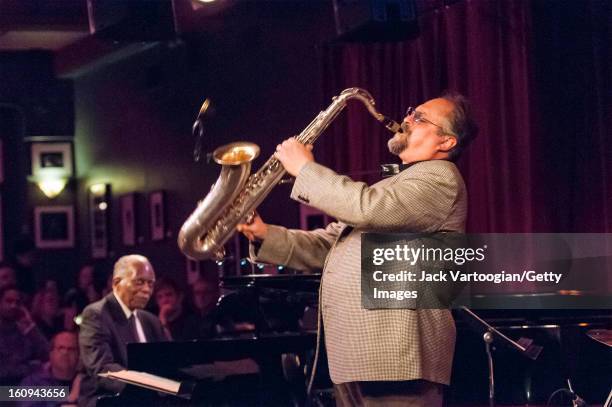 American jazz musician Joe Lovano, on tenor saxophone, leads his quartet at Birdland, New York, New York, April 8, 2009. Pianist Hank Jones is at...