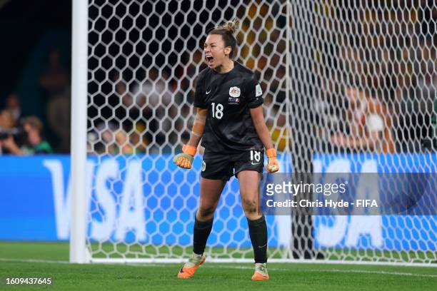 Mackenzie Arnold of Australia celebrates as Vicki Becho of France misses her side's tenth penalty in the penalty shoot out during the FIFA Women's...