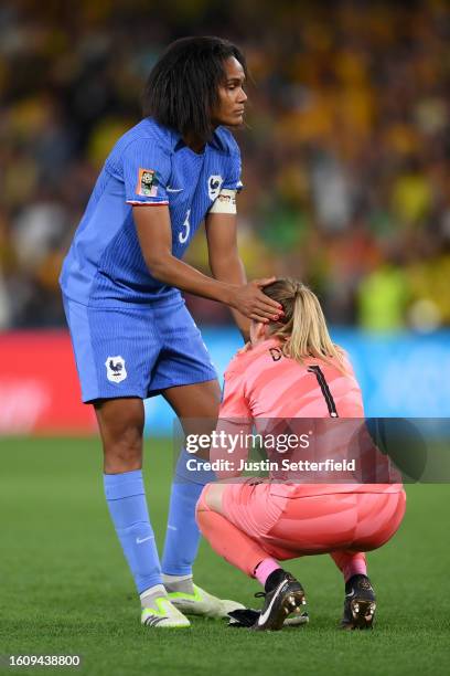 Solene Durand of France is consoled by Wendie Renard after the team's defeat through the penalty shoot out following the FIFA Women's World Cup...