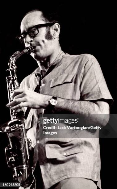 American jazz musician Paul Desmond on alto saxophone performs with the Dave Brubeck Quartet in the Schaefer Music Festival series at Wollman Rink,...