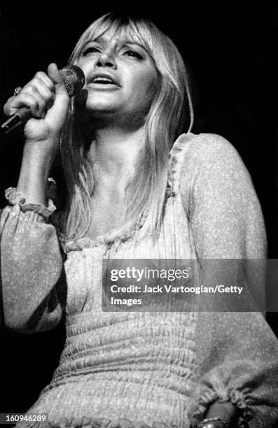 American singer and songwriter Mary Travers performs in a solo concert at the Schaefer Music Festival, Wollman Rink, Central Park, New York, New...