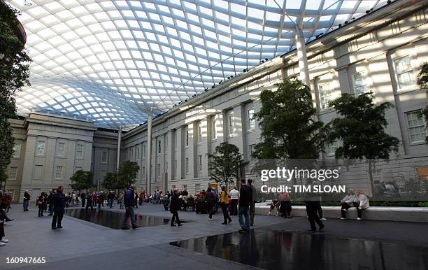 The new Robert and Arlene Kogod Courtyard, with its elegant glass canopy designed by world renowned architect Norman Foster of Foster and Partners in...