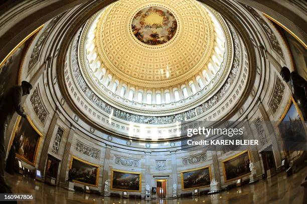 The Rotunda of the US Capitol is seen on July 28, 2009 on Capitol Hill in Washington, DC. Thousands of visitors walk through the Rotunda daily. AFP...