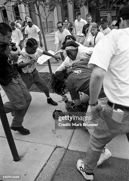 June 22, 1996. A dozen members of a self-anointed and unwelcome KKK group came to Ann Arbor to hold a thumb-in-your-eye rally at City Hall. A protest...