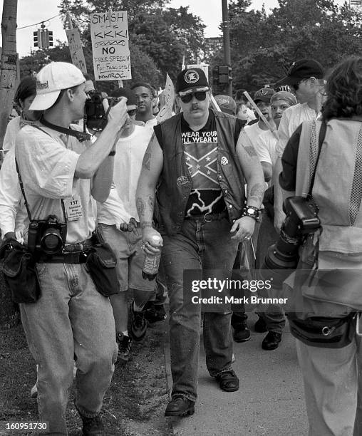 June 22, 1996. A dozen members of a self-anointed and unwelcome KKK group came to Ann Arbor to hold a thumb-in-your-eye rally at City Hall. A protest...