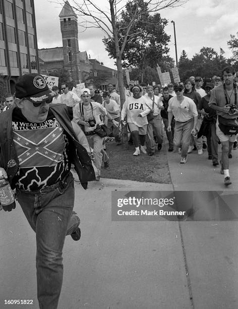 June 22, 1996. A dozen members of a self-anointed and unwelcome KKK group came to Ann Arbor to hold a thumb-in-your-eye rally at City Hall. A protest...