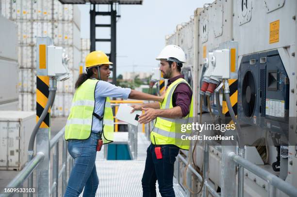 coworker conflict - refrigerator truck stock pictures, royalty-free photos & images