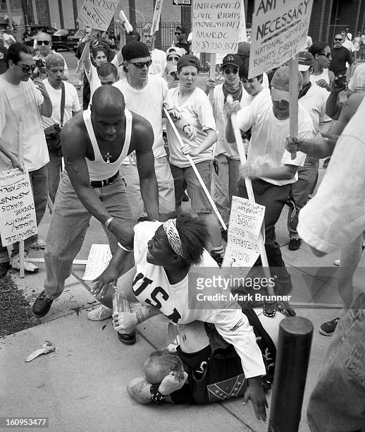 June 22, 1996. A dozen members of a self-anointed and unwelcome KKK group came to Ann Arbor to hold a thumb-in-your-eye rally at City Hall. A protest...
