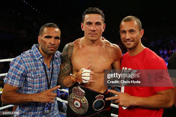 Anthony Mundine, Sonny Bill Williams and Quade Cooper celebrate after Sonny Bill Williams heavyweight bout win against Francois Botha at the Brisbane...