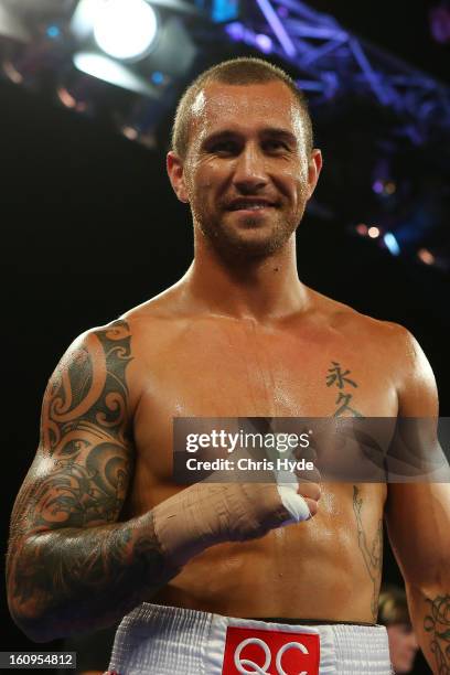 Quade Cooper celebrate winning his fight against Barry Dunnett in their cruiserweight fight at the Brisbane Entertainment Centre on February 8, 2013...