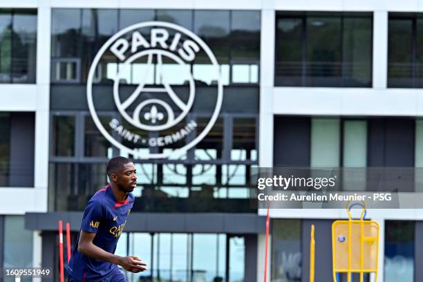 Ousmane Dembele warms up during a Paris Saint-Germain training session after signing his 5 year contract at Campus PSG on August 12, 2023 in Paris,...