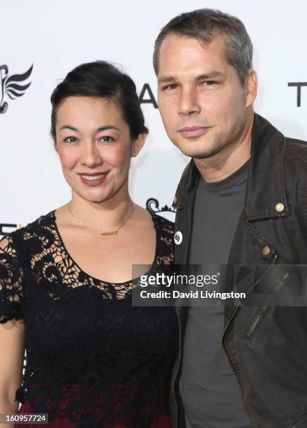 Graphic designer Shepard Fairey and wife Amanda Fairey attend the 2nd Annual will.i.am TRANS4M Boyle Heights benefit concert at Avalon on February 7,...
