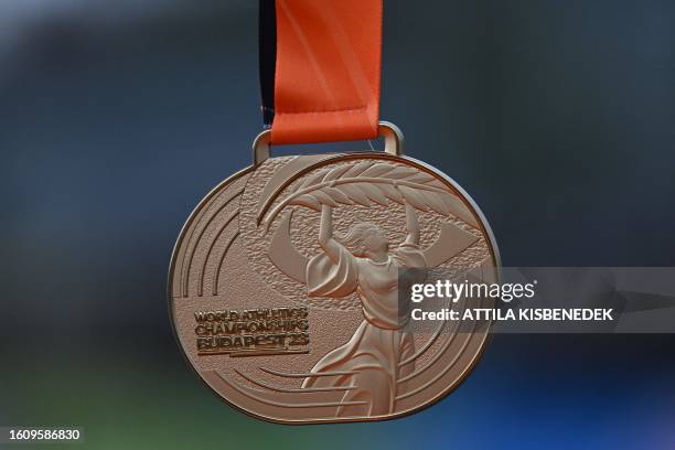 The gold medal is displayed ahead of the men's 20km race walk final during the World Athletics Championships in Budapest on August 19, 2023.