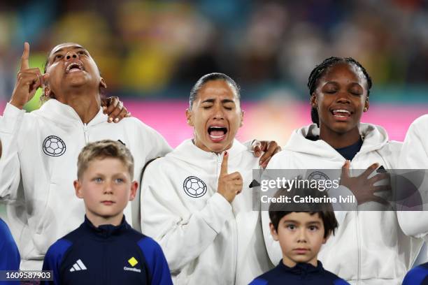 Jorelyn Carabali, Carolina Arias, and Linda Caicedo of Colombia sing the national anthem ahead of the FIFA Women's World Cup Australia & New Zealand...