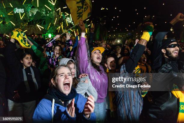 Matildas fans cheer at Melbourne's Federation Square cheer for the victory of the FIFA Women's World Cup Quarter Final match between Australia and...