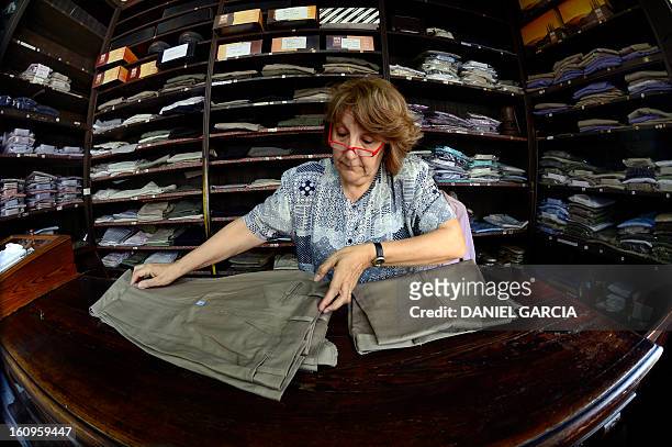 Argentine Mirta at work at the Aux Charpentiers store and "bombachas" factory, in Buenos Aires, on November 16, 2012. The typical bombachas worn by...