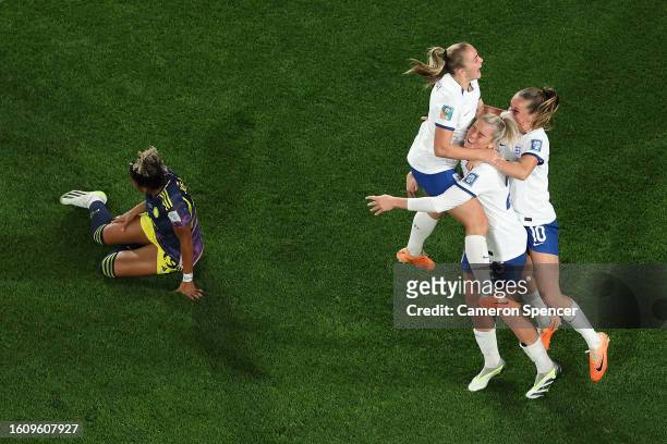 Alessia Russo of England celebrates with teammates Georgia Stanway and Ella Toone after scoring her team's second goal during the FIFA Women's World...