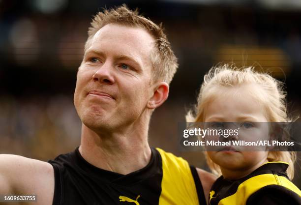 Jack Riewoldt of the Tigers sheds a tear after his final match during the 2023 AFL Round 23 match between the Richmond Tigers and the North Melbourne...
