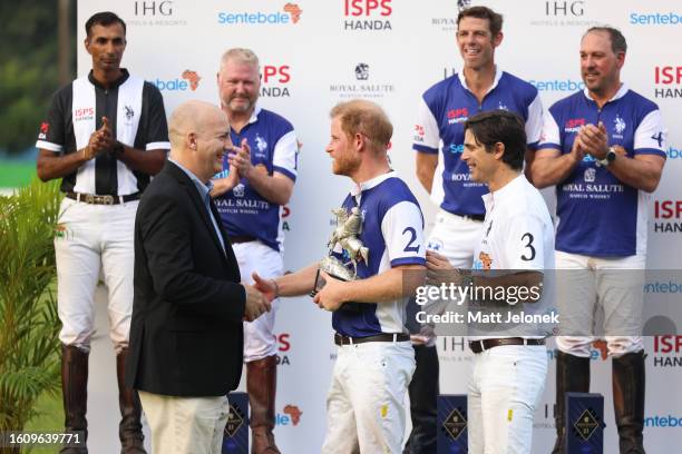 Prince Harry, The Duke of Sussex, Co-Founding Patron of Sentebale shakes hand with Kevin O’Brien, Executive Director, The Handa Foundation at the...