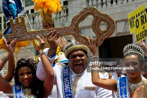 King Momo holds the key of Rio de Janeiro after receiving it from Rio's Mayor Eduardo Paes and thus officially opening the city's world famous...