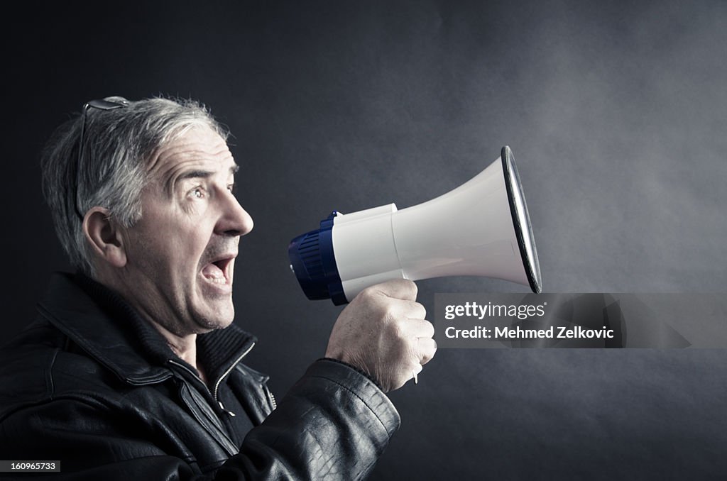 Man yelling on megaphone