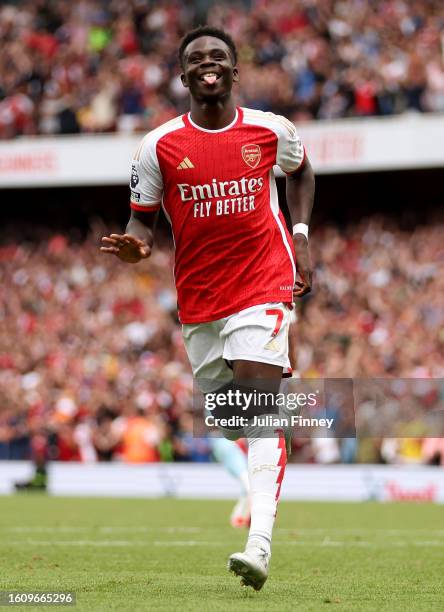 Bukayo Saka of Arsenal celebrates after scoring the team's second goal during the Premier League match between Arsenal FC and Nottingham Forest at...