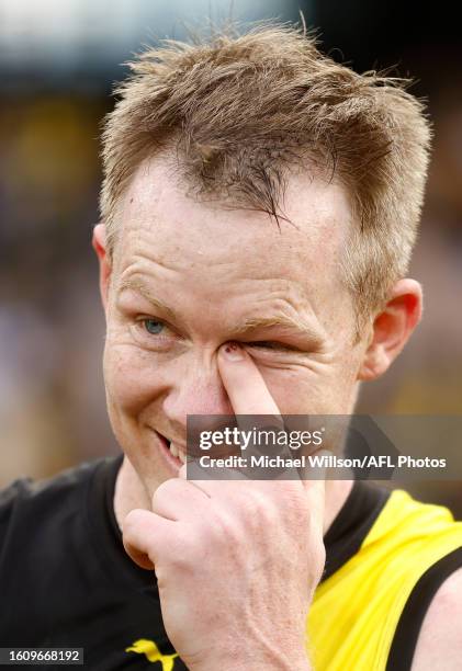 Jack Riewoldt of the Tigers sheds a tear after his final match during the 2023 AFL Round 23 match between the Richmond Tigers and the North Melbourne...
