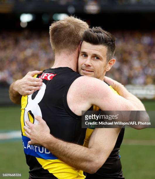 Trent Cotchin of the Tigers and Jack Riewoldt of the Tigers embrace after their final matches during the 2023 AFL Round 23 match between the Richmond...
