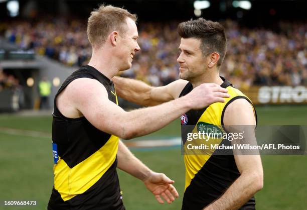 Trent Cotchin of the Tigers and Jack Riewoldt of the Tigers embrace after their final matches during the 2023 AFL Round 23 match between the Richmond...