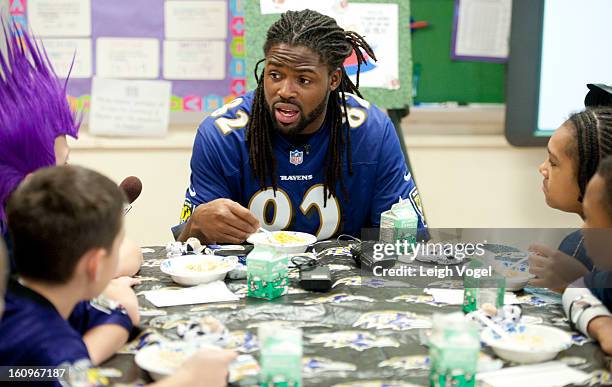 Torrey Smith shares a protein packed breakfast, including milk, with students in support of the Breakfast Blitz campaign. The initiative is a...