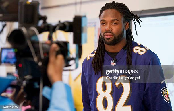 Torrey Smith shares a protein packed breakfast, including milk, with students in support of the Breakfast Blitz campaign. The initiative is a...