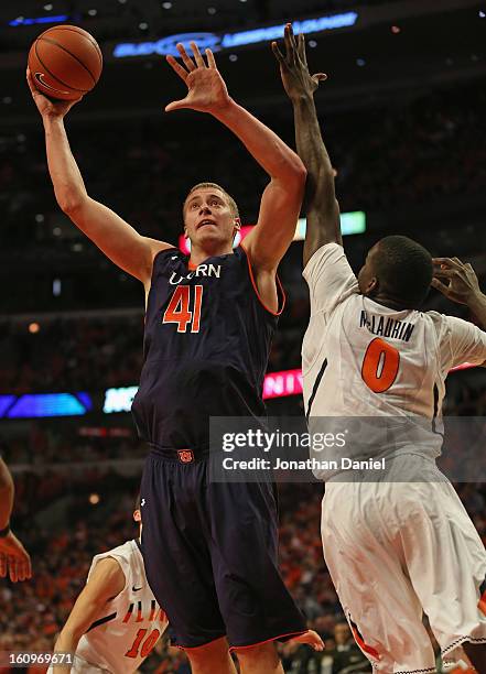 Rob Chubb of the Auburn Tigers shoots against Sam Mclaurin of the Illinois Fighting Illini at United Center on December 29, 2012 in Chicago,...