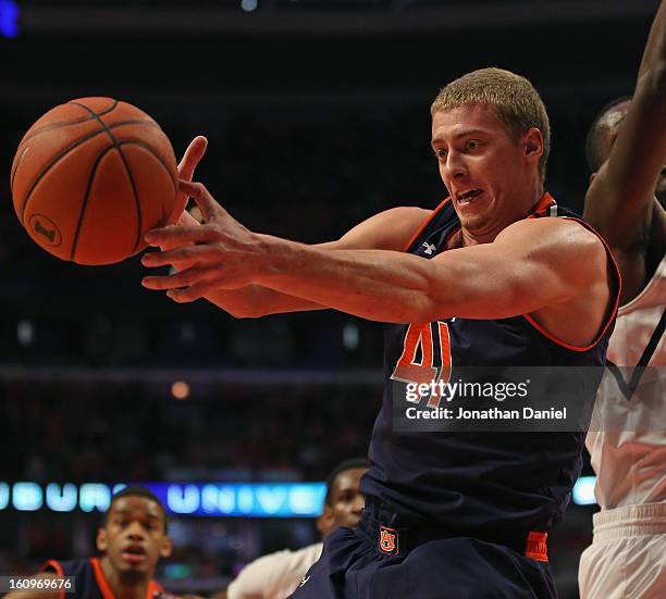 Rob Chubb of the Auburn Tigers rebounds against the Illinois Fighting Illini at United Center on December 29, 2012 in Chicago, Illinois. Illinois...