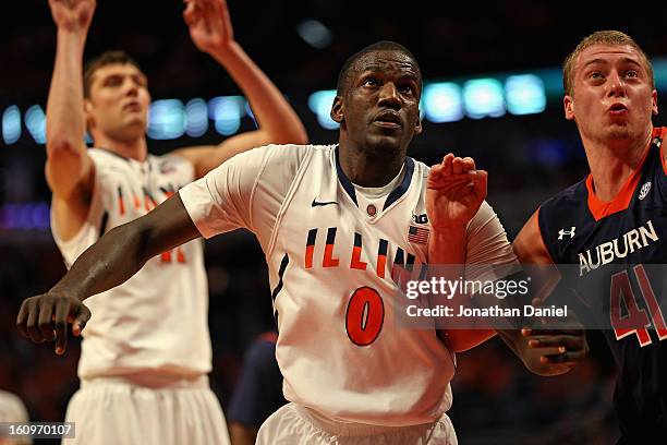 Sam McLaurin of the Illinois Fighting Illini battles for position with Rob Chubb of the Auburn Tigers at United Center on December 29, 2012 in...