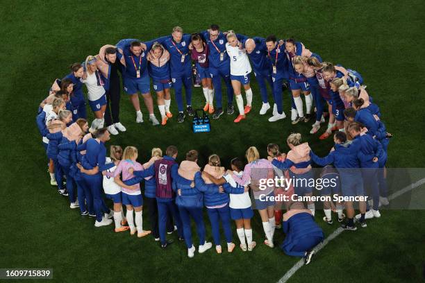 England players huddle after the team's 2-1 victory in the FIFA Women's World Cup Australia & New Zealand 2023 Quarter Final match between England...