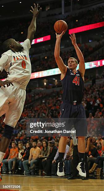 Rob Chubb of the Auburn Tigers shooits against Sam McLaurin of the Illinois Fighting Illini at United Center on December 29, 2012 in Chicago,...