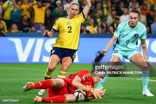 Sweden's goalkeeper Zecira Musovic makes a save during the Australia and New Zealand 2023 Women's World Cup third place play-off football match...
