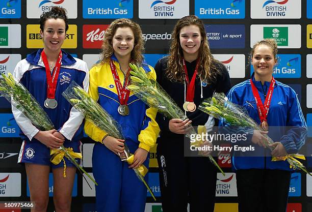 Clare Cryan, Alicia Bragg, Grace Reid and Francesca Del Celo pose with their medals following the Women's 1m Final on day 1 of the British Gas Diving...