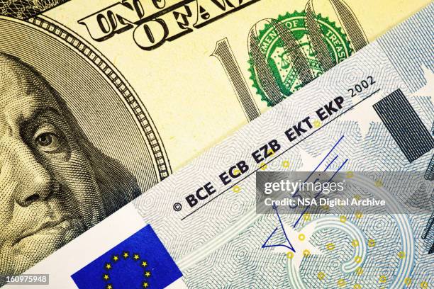 one hundred dollar bill and european union euro note - euro stock pictures, royalty-free photos & images