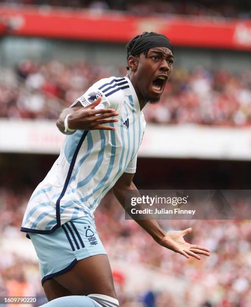 Anthony Elanga of Nottingham Forest celebrates after teammate Taiwo Awoniyi scores the team's first goal during the Premier League match between...