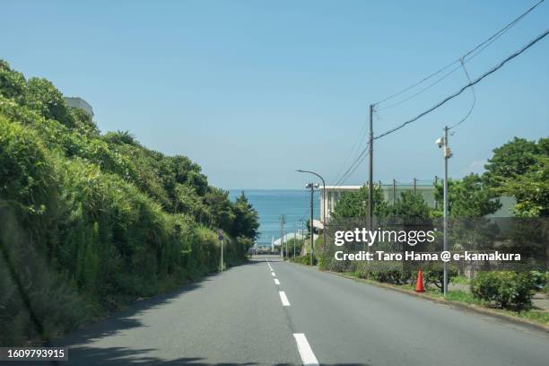 the elevated road to the beach in kanagawa of japan - non urban scene stock pictures, royalty-free photos & images