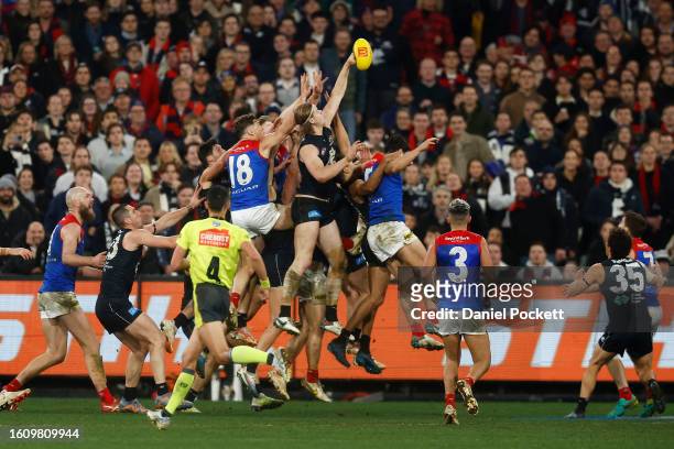 Tom De Koning of the Blues spoils the ball in the final seconds before winning the round 22 AFL match between Carlton Blues and Melbourne Demons at...