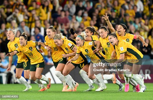 Australia players celebrate the team’s victory through the penalty shoot out following the FIFA Women's World Cup Australia & New Zealand 2023...