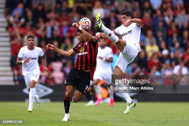 Dominic Solanke of AFC Bournemouth and Nayef Aguerd of West Ham United battle for possession during the Premier League match between AFC Bournemouth...