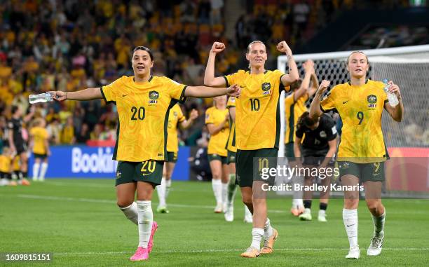 Sam Kerr, Emily Van-Egmond and Caitlin Foord of Australia applaud fans after the team’s victory through the penalty shootout following the FIFA...
