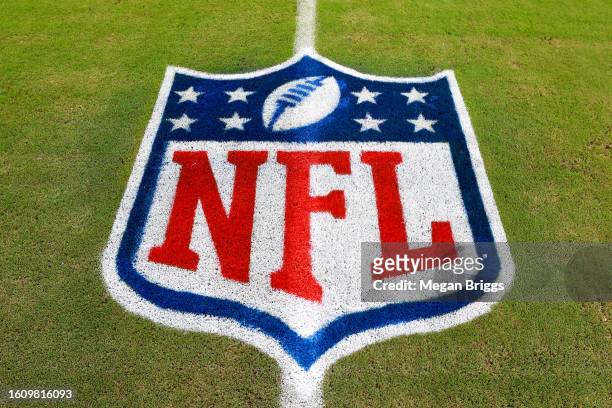 Detailed view of the NFL logo is seen on the field prior to a preseason game between the Atlanta Falcons and Miami Dolphins at Hard Rock Stadium on...