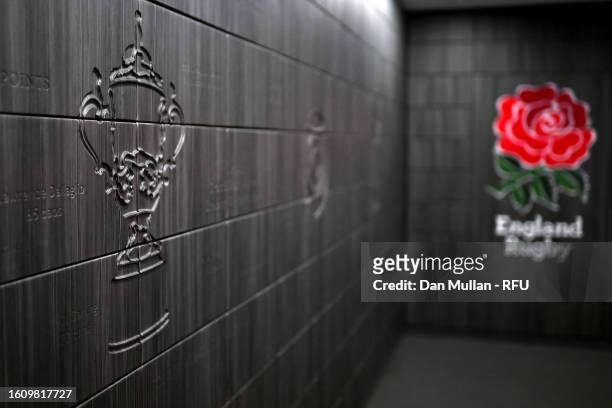 Detailed view of the engraving of the Rugby World Cup trophy on the wall of the entrance to the England changing room prior to the Summer...