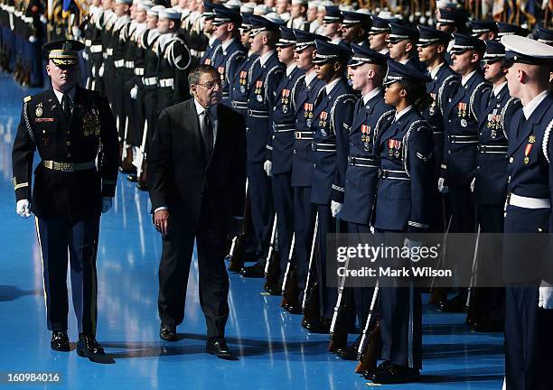 Secretary of Defense Leon Panetta and U.S. Army Col. James Markert Commander 3rd. U.S. Infantry Regiment, inspect the troops during a Armed Service...