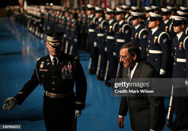 Secretary of Defense Leon Panetta and U.S. Army Col. James Markert , Commander 3rd. U.S. Infantry Regiment, inspect the troops during a Armed Service...