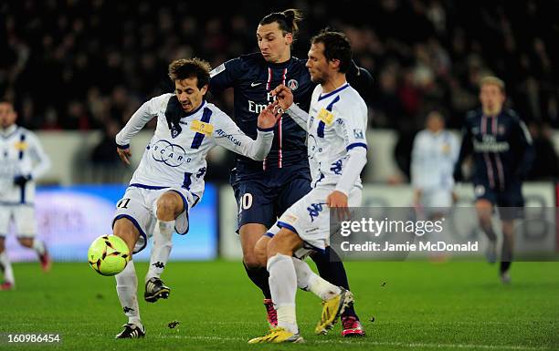 Zlatan Ibrahimovic of Paris Saint-Germain battles with Fethi Harek of SC Bastia during the Ligue 1 match between Paris Saint-Germain FC and SC Bastia...